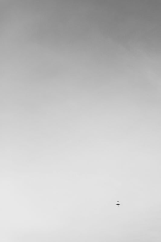 a plane flying in the sky