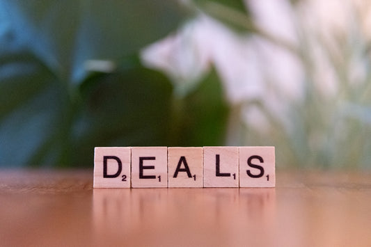 A close up of a scrabble type word on a table
