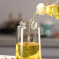 Glass Oil Bottle Dispenser With Auto Flip Cap 650ml