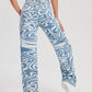High-Waist Denim Pants with Blue Swirl Print – Stylish Wavy Ripple Graphic, Zipper Button Closure, and Slash Pockets - Ladies